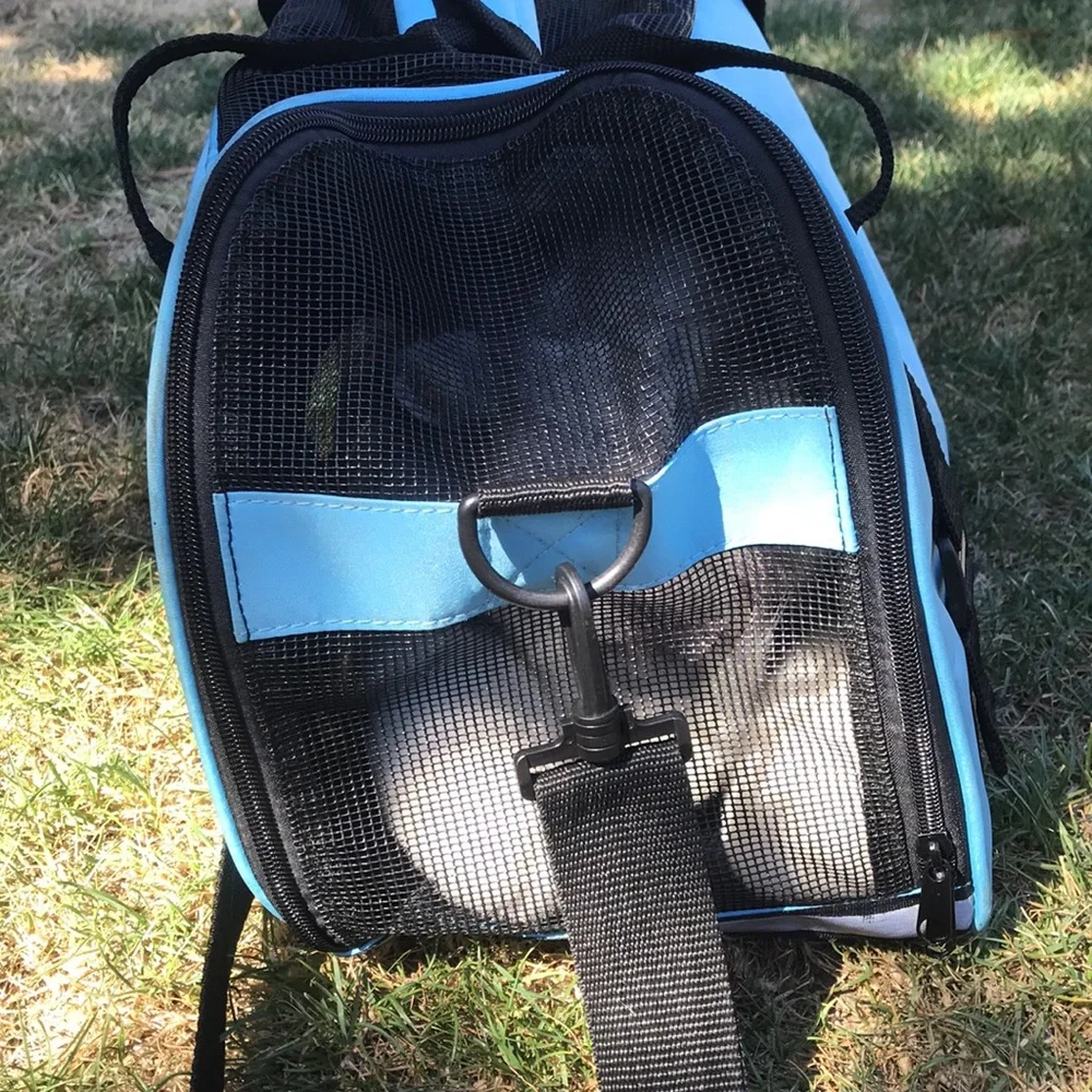 - Pet Carrier with shoulder strap light blue and black well vented used 1x